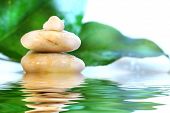 stock photo of steady  - Spa stones with leaves with water reflection - JPG 