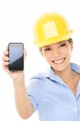 image of multicultural  - Engineer or architect woman showing smart mobile phone copy space - JPG 