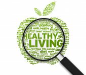 pic of health  - Magnified Apple with the words Healthy Living on white background - JPG 