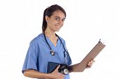 pic of pressure  - Young female nurse practitioner ready with stethoscope blood pressure gage and records to check your healthy vital signs for the Dr - JPG 