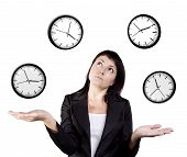 picture of time  - A young woman juggling the management of time - JPG 
