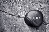 picture of religion  - The word hope on a zen stone against concrete - JPG 