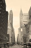 stock photo of buildings  - New York City Manhattan street view with Chrysler Building skyscrapers and busy traffic black and white - JPG 