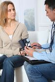 pic of bloodpressure  - Doctor measuring blood pressure - JPG 