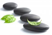 stock photo of zen  - zen stones with leaves isolated - JPG 