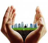 stock photo of buildings  - person holding a business - JPG 