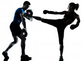 stock photo of man  - one caucasian couple man woman personal trainer coach man woman boxing training silhouette studio isolated on white background - JPG 