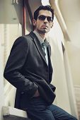pic of business people  - Young handsome guy posing in sunglasses - JPG 