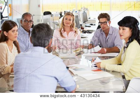 Picture or Photo of Team Meeting In Creative Office