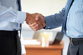image of handshake  - two male hands in business handshake - JPG 