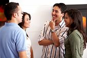stock photo of group  - group of friends in an apartment talking - JPG 