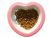 foto of food  - heart shaped dog dish with dry dog food inside - JPG 