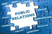 stock photo of puzzle  - Public relations blue puzzle pieces assembled - JPG 