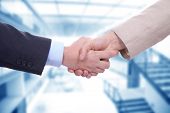 foto of handshake  - Business men in a handshake at the office - JPG 