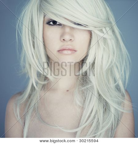 Picture or Photo of Photo of young beautiful woman with magnificent hair