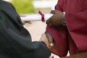 image of handshake  - Graduate Receiving Diploma and Handshake - JPG 