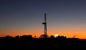 stock photo of sunset  - View at oil rig in the sunset - JPG 