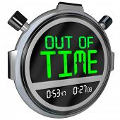 foto of time  - A stopwatch with the words Out of Time representing a deadline that is approaching or has passed and that you have run out of opportunity to complete or finish a test - JPG 