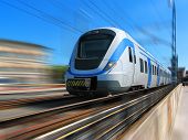 picture of speed  - White high speed commuter train with motion blur - JPG 