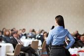 foto of meeting  - Beautiful business woman is speaking on conference - JPG 