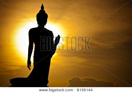 Picture or Photo of A silhouette of s Buddha statue, Thailand