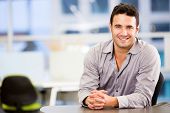 stock photo of confident  - Handsome business man smiling at the office - JPG 