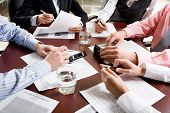 stock photo of meeting  - Image of different hands at business meeting - JPG 