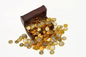 image of finance  - Treasury trunk with chocolate candy euro coins on white background - JPG 