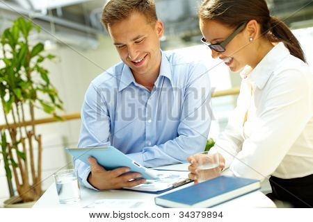 Picture or Photo of Image of a happy business team enjoying the results of their work