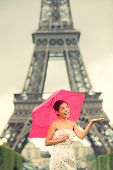 stock photo of france  - Eiffel Tower Paris woman - JPG 