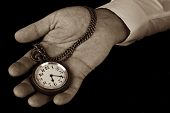 picture of watch  - Pocket watch in hand hold look time detail duotone - JPG 