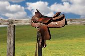 pic of horse  - Horse saddle on rural fence - JPG 