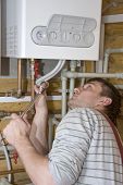 stock photo of home  - Plumber at work - JPG 