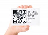 picture of code  - Hand showing visit card with QR code information - JPG 