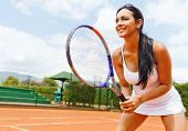 picture of competition  - Woman playing tennis and waiting for the service - JPG 