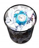 pic of time  - Blue alarm clock sat in a waster paper basket - JPG 