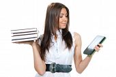 pic of reading  - Woman compare books and new wireless reading digital book Device - JPG 