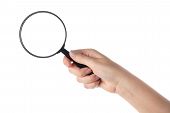 image of magnifying  - Female hand holding the magnifying glass isolated on white background - JPG 