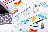stock photo of finance  - Financial paper charts and graphs on the table - JPG 