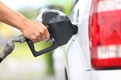 stock photo of industrial  - Pumping gas at gas pump - JPG 
