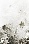 foto of glisten  - Silver sparkling stars on a white glistening background - JPG 