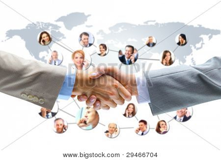 Picture or Photo of Business people handshake with company team in background