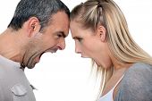 stock photo of dilemma  - Couple having a screaming match - JPG 