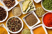 picture of food  - Various spices and herbs on wooden table - JPG 