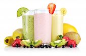 foto of health  - Fruit smoothies with black currant strawberry kiwi orange and banana isolated on white background - JPG 