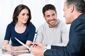 picture of future  - Financial consultant presents bank investments to a young couple - JPG 