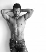 picture of health  - Portrait of a sexy muscular male model against white background with copy space - JPG 