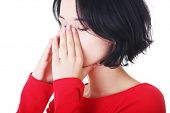 image of pressure  - Young woman with sinus pressure pain  - JPG 