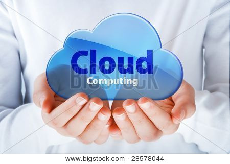 Picture or Photo of Hands exhibiting a blue cloud computing symbol