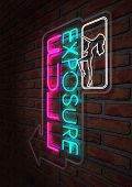picture of incorporate  - An illuminated neon sign for a strip club mounted on a brick wall incorporating an arrow a dancing girl and the words full exposure - JPG 